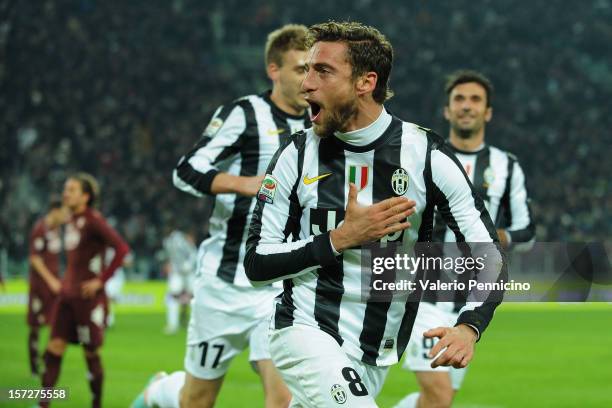 Claudio Marchisio of Juventus celebrates the opening goal during the Serie A match between Juventus and Torino FC at Juventus Arena on December 1,...