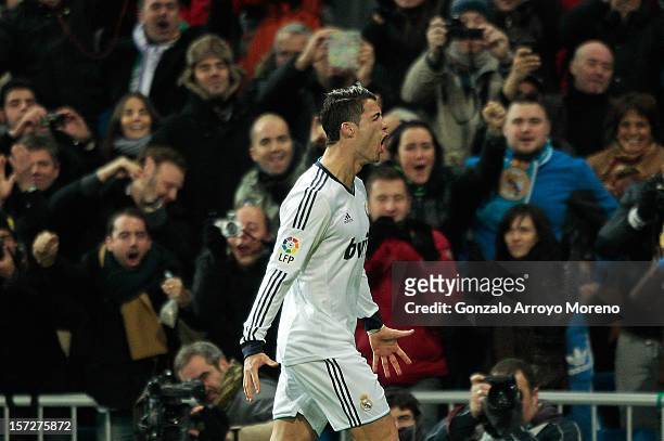 Cristiano Ronaldo of Real Madrid CF celebrates scoring their first goal during the La Liga match between Real Madrid CF and Club Atletico de Madrid...