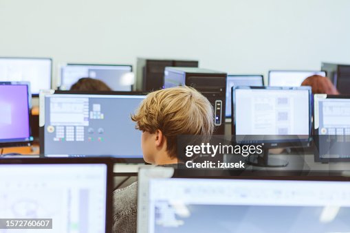 High school student learing computer programming. High school student learing computer programming.