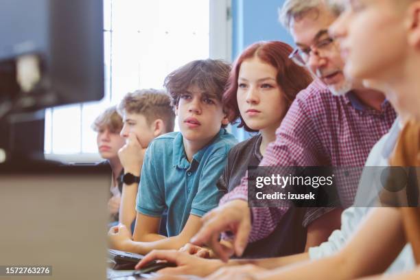 group of high school students learing programming - kid coding stock pictures, royalty-free photos & images