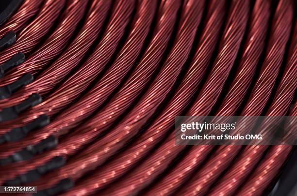 close-up view of the copper coil of induction stove - beton stairs stock pictures, royalty-free photos & images