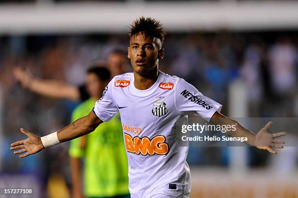 Neymar of Santos celebrates a scored goal during a match between Santos and Palmeiras as part of the Brazilian Serie A Championship 2012 at Vila...