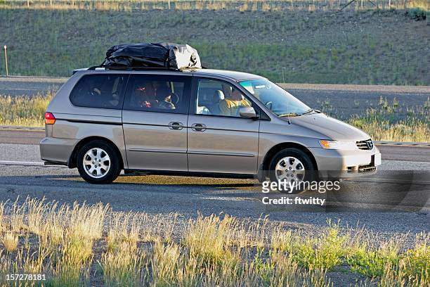 family vacation in a gray minivan - mini van stock pictures, royalty-free photos & images