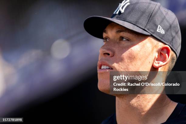 Aaron Judge of the New York Yankees looks on from the dugout during a game against the Colorado Rockies at Coors Field on July 16, 2023 in Denver,...