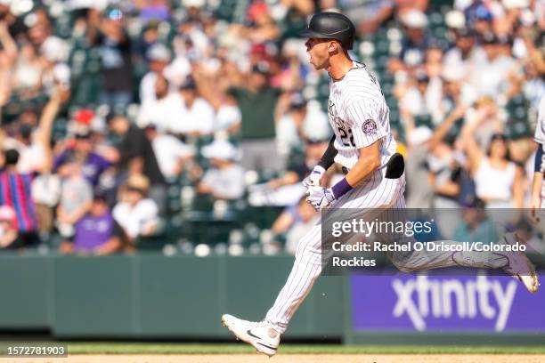 Nolan Jones of the Colorado Rockies reacts after hitting a game-tying two-run home run during the eleventh inning of a game against the New York...