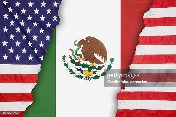 mexican flag dividing an american one - constitution ripped stock pictures, royalty-free photos & images