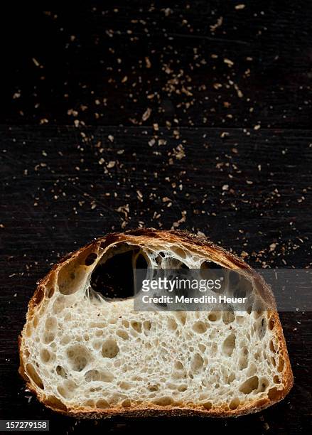 slice of bread with crumbs - breadcrumb stock pictures, royalty-free photos & images