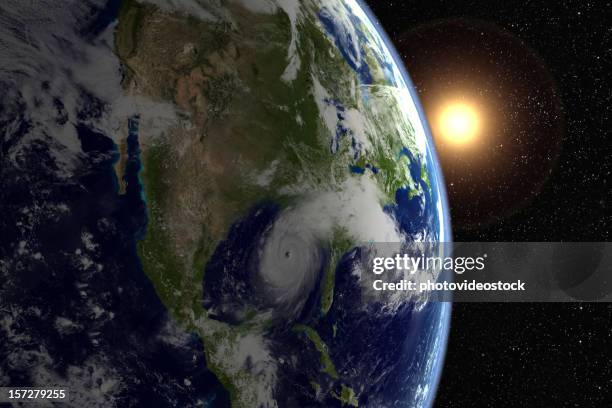 sunflare over florida with visible hurricane - spinning stock pictures, royalty-free photos & images