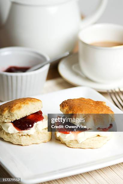 sweet cream teas served on delicate white china - scone stock pictures, royalty-free photos & images