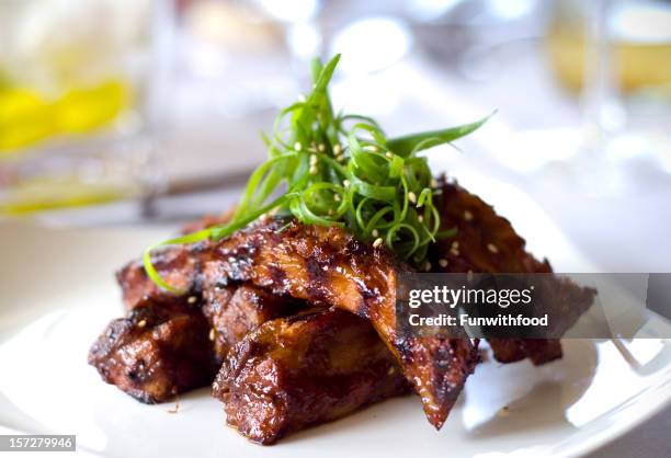 barbeque ribs, pork meat sparerib dinner & food at gourmet restaurant - sparerib stock pictures, royalty-free photos & images