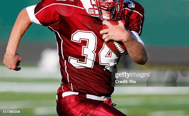 running back - football americain stock pictures, royalty-free photos & images