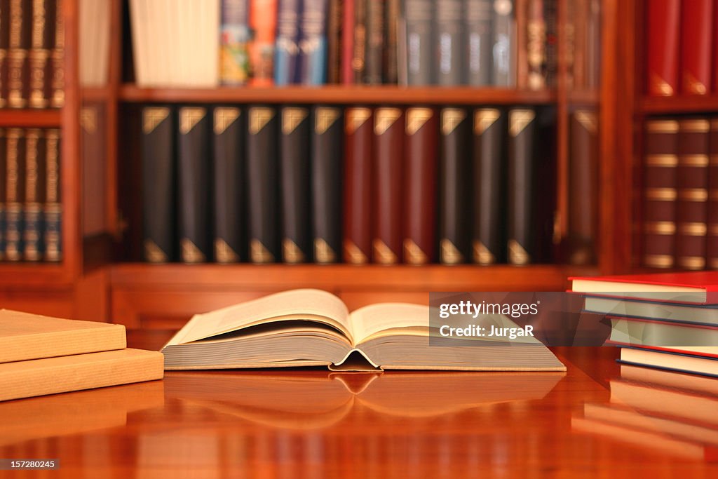 Library Open Book Laying on a Desk in a Study