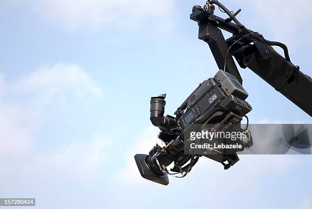 camera on crane or jib - film crew studio stock pictures, royalty-free photos & images