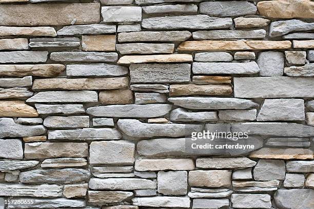 pared de piedra, apilado y textura de fondo de plana - farallón fotografías e imágenes de stock