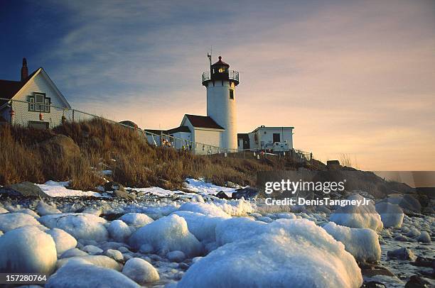 eastern point lighthouse in gloucster - boston winter stock pictures, royalty-free photos & images