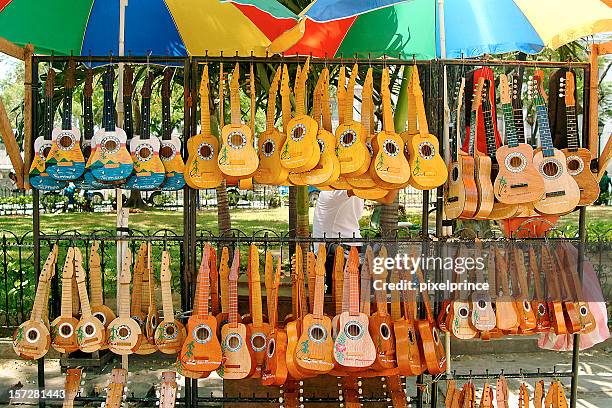 a very large amount and different types of ukuleles  - cebu province stock pictures, royalty-free photos & images