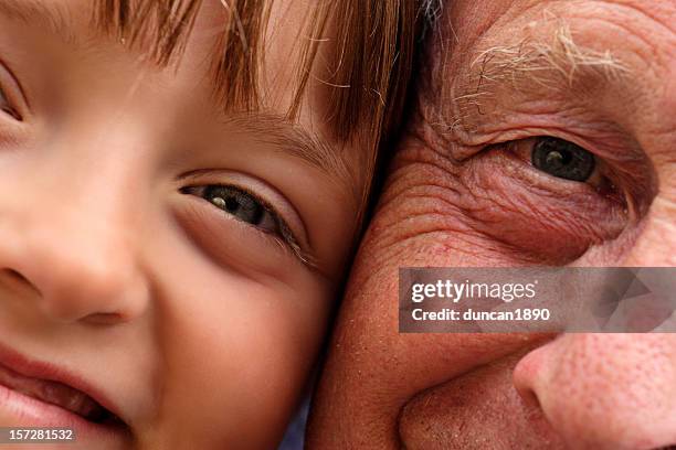 young & old - extreme close up face stock pictures, royalty-free photos & images