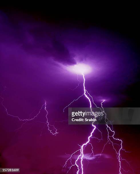 purple and pink sky with lightning striking - lightning purple stock pictures, royalty-free photos & images