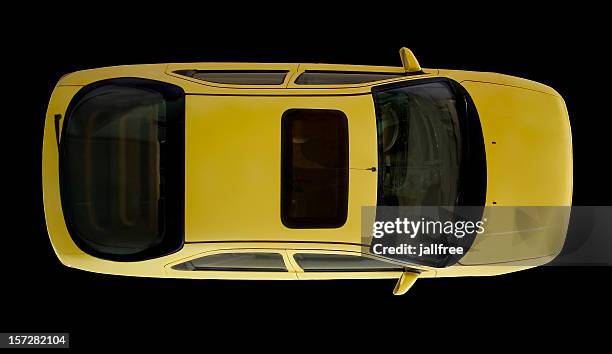 arial view of yellow car isolated on black - yellow taxi stockfoto's en -beelden