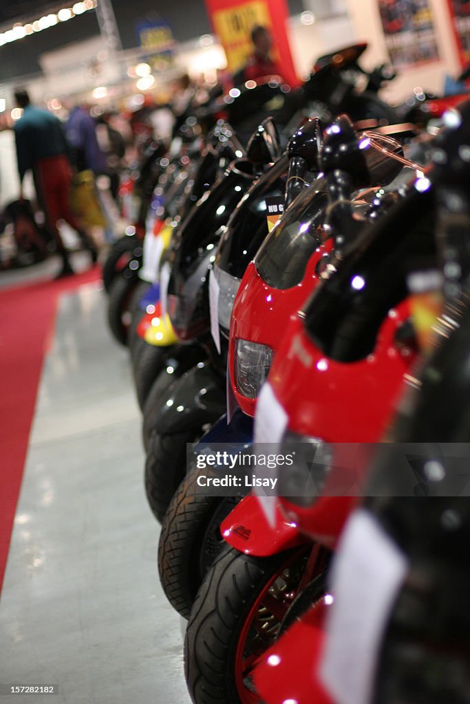 A line of motorcycles in different colors