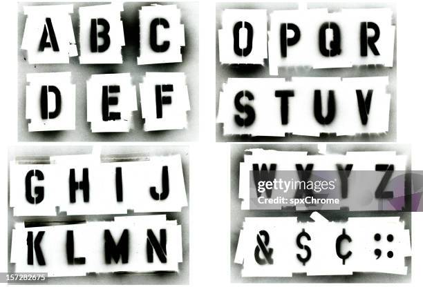 black spray painted schablone alphabet-set - text stock-fotos und bilder