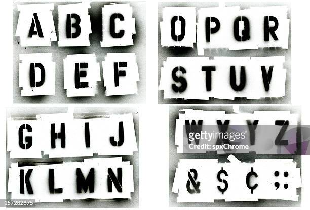 black spray painted stencil alphabet set - spray paint stock pictures, royalty-free photos & images
