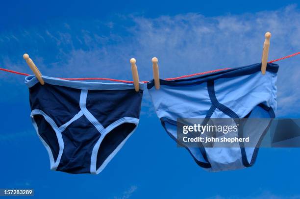 pair of retro male underpants on a washing line - small stock pictures, royalty-free photos & images