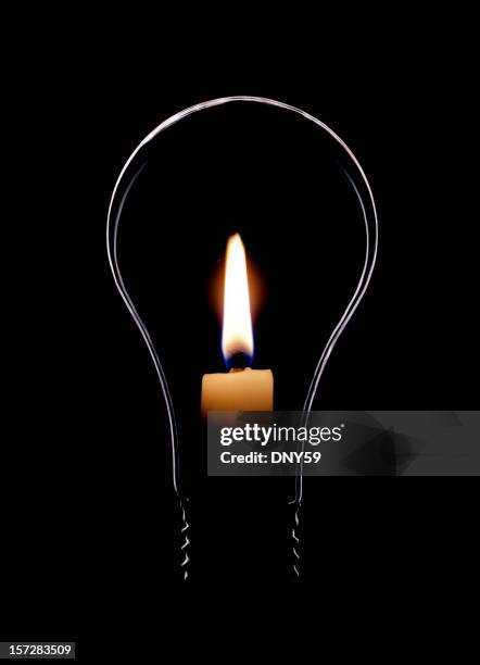 lightbulb with flame - blackout stock pictures, royalty-free photos & images