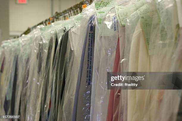 drycleaned clothing 2 - dry cleaning shop stock pictures, royalty-free photos & images