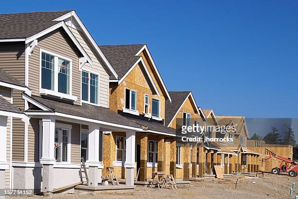 housing development under construction - residential building stock pictures, royalty-free photos & images