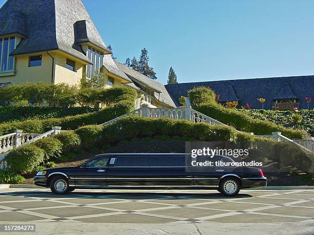 the good life: limousine & mansion - limo stockfoto's en -beelden