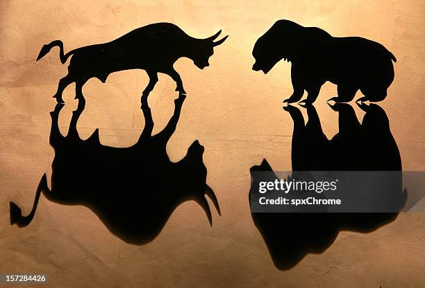 stock market - bulls vs bears - bull bear stock pictures, royalty-free photos & images