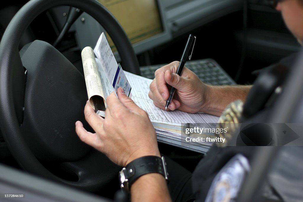 Police Officer Writing Ticket 2 High-Res Stock Photo - Getty Images