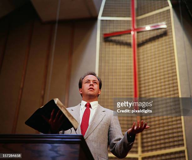 traditional protestant / evangelical preacher - preacher stock pictures, royalty-free photos & images