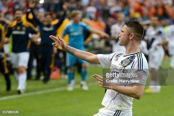 Robbie Keane of Los Angeles Galaxy reacts after scoring on a penalty kick in the second half against the Houston Dynamo in the 2012 MLS Cup at The...