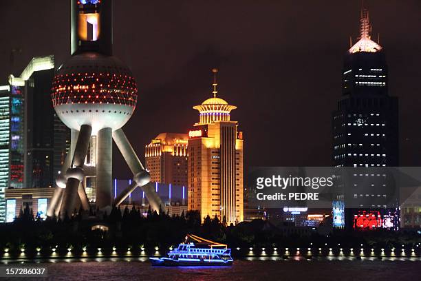 shanghai, china city skyline at night - jin mao tower stock pictures, royalty-free photos & images