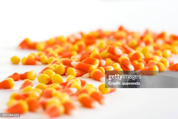 candy corn group on white, selective focus, copy space - candy corn stock pictures, royalty-free photos & images