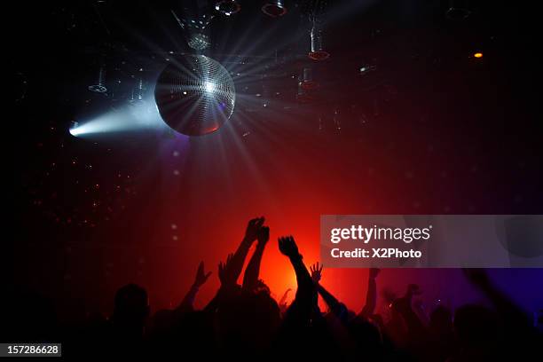 neon lights in a disco on a friday night - disco ball stock pictures, royalty-free photos & images