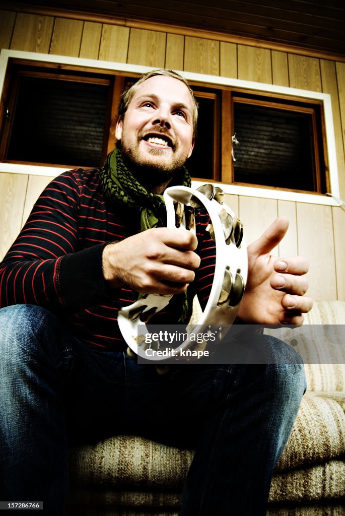 Man playing tambourine