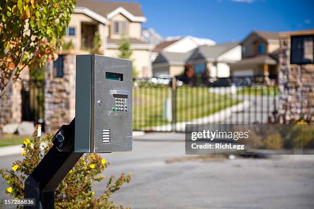 gated community - intercom stock pictures, royalty-free photos & images