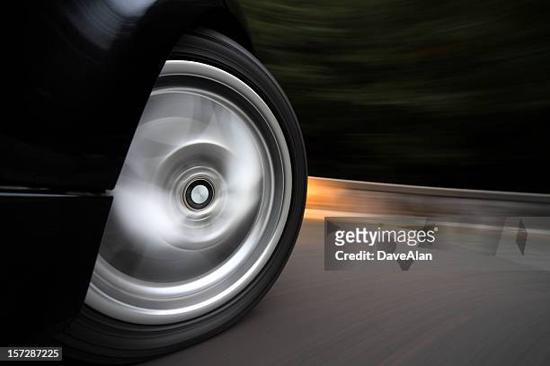 wheelspin - car turning stock pictures, royalty-free photos & images