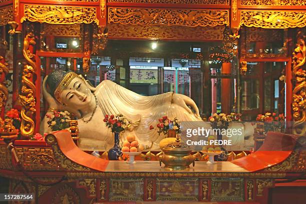 jade buddha statue - shanghai temple stock pictures, royalty-free photos & images