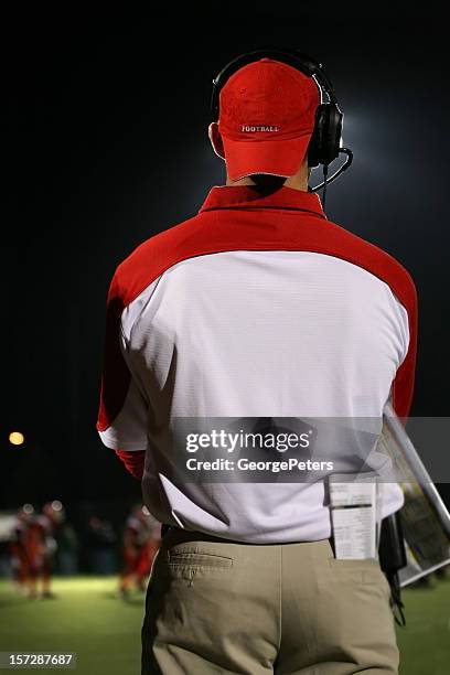 friday night lights - american football coach stock-fotos und bilder