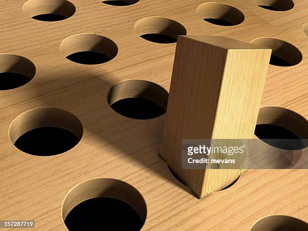 square peg in a round hole - hole stock pictures, royalty-free photos & images