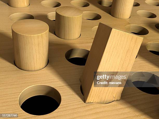 square peg in a round hole - hole stock pictures, royalty-free photos & images