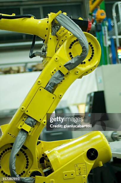 robot at work in line production - ad placement stock pictures, royalty-free photos & images