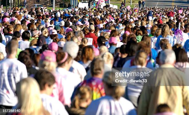 crowd at race for the cure - people of different races stock pictures, royalty-free photos & images