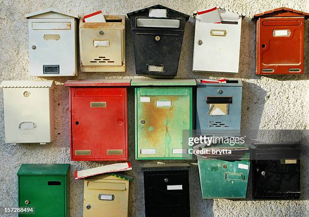 colorful mailboxes at entrance of apartment buildings - brevlåda bildbanksfoton och bilder