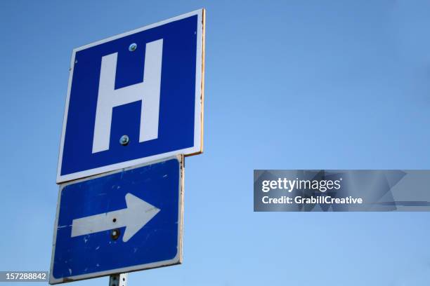 &quot;h&quot; with arrow: to the hospital - hospital sign stock pictures, royalty-free photos & images