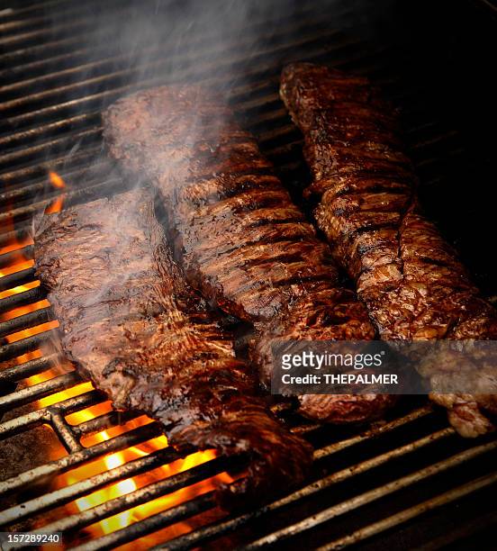 churrasco in the grill - grilled steak stock pictures, royalty-free photos & images